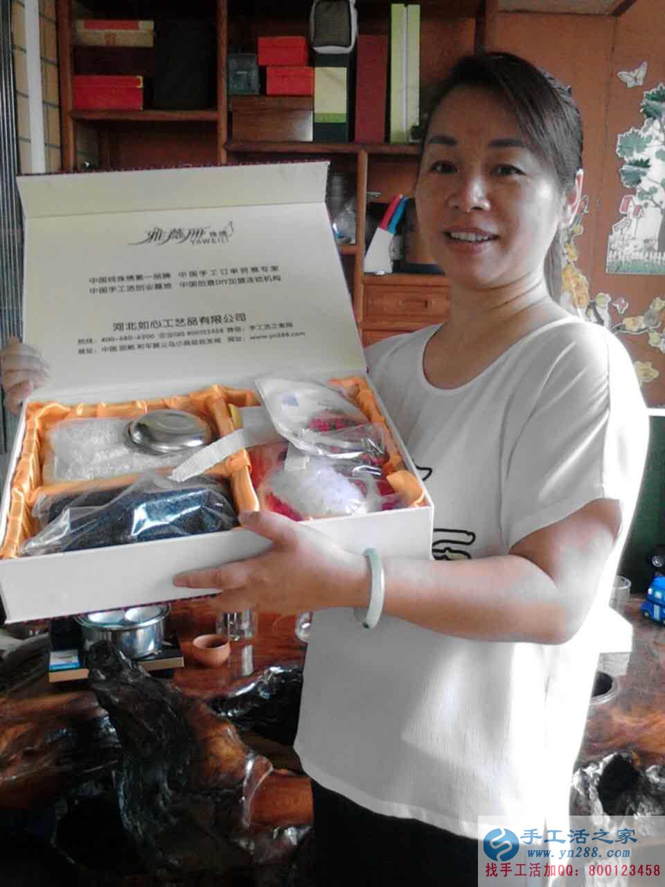 廣西百色市覃女士找到可以在家做的手工活，不交押金不用錢