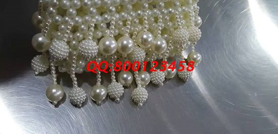 11月12日，多發(fā)材料，拿回家做的手工活，這個手工活外發(fā)加工企業(yè)一直這樣做，圖為勵志珠珠繡手工珠包成品實拍